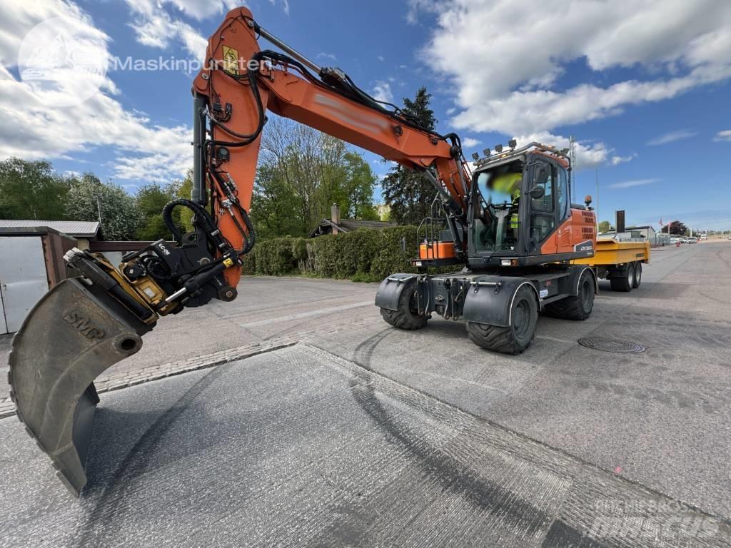 Doosan DX 160 W حفارات بعجل