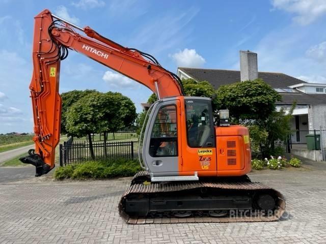 Hitachi ZX 135 US حفارات زحافة