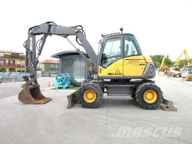 Mecalac 714 MW2 حفارات بعجل