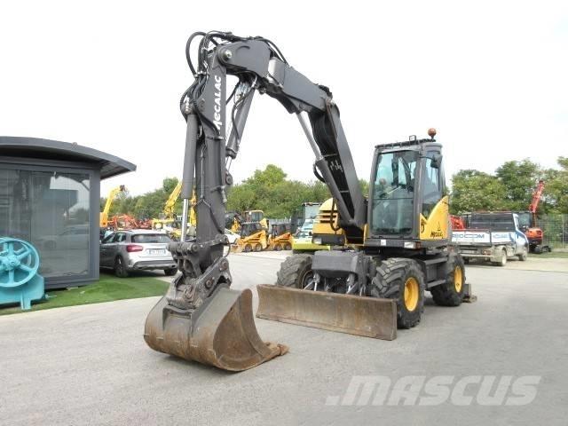 Mecalac 714 MW2 حفارات بعجل