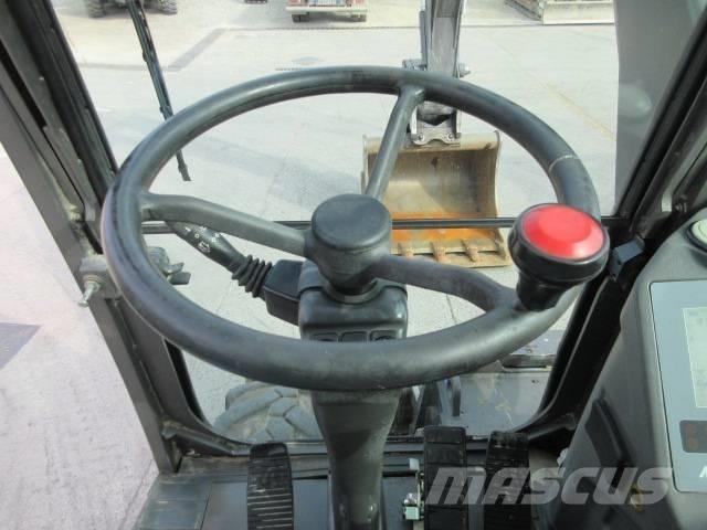 Mecalac 714 MW2 حفارات بعجل