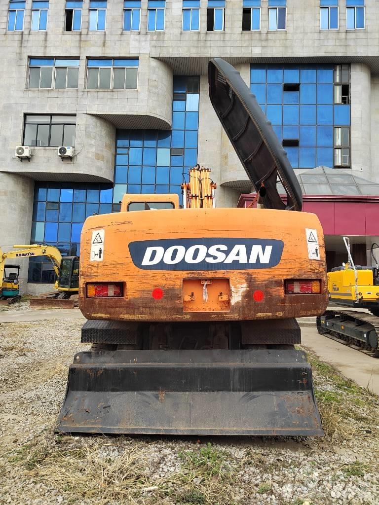 Doosan DH 210 W-7 حفارات بعجل