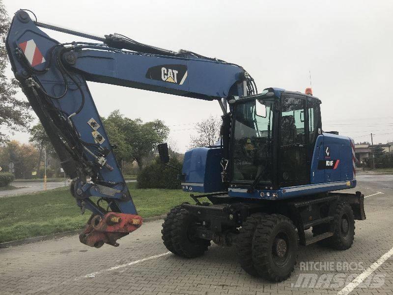 CAT M318F حفارات بعجل