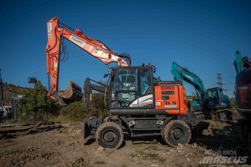 Hitachi ZX 145 حفارات بعجل
