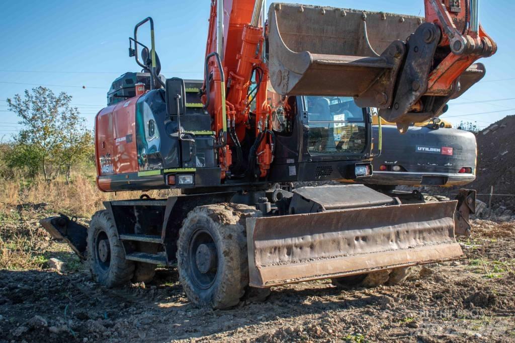 Hitachi ZX 145 حفارات بعجل