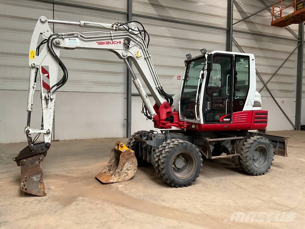 Takeuchi TB 295 W حفارات بعجل