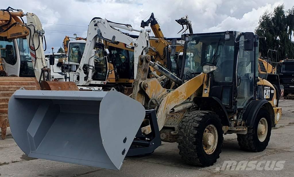 CAT 906 H لوادر بعجل