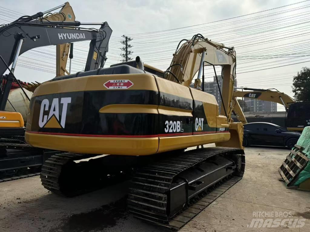 CAT 320 B L حفارات زحافة
