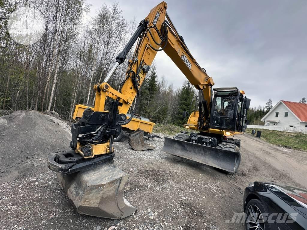 JCB JS 145 W حفارات بعجل