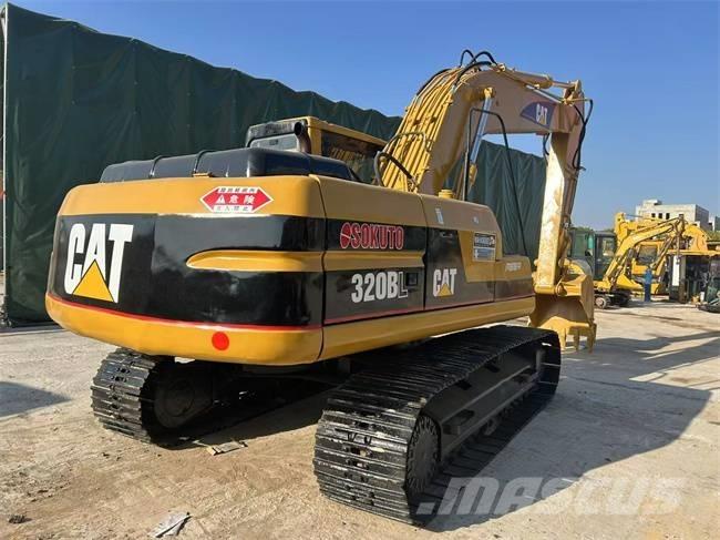 CAT 320 B حفارات زحافة