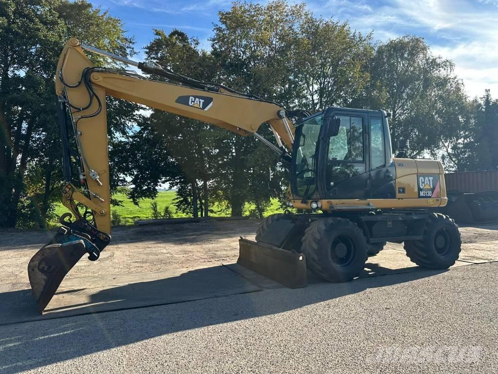 CAT M 313 D - 13.285H حفارات بعجل