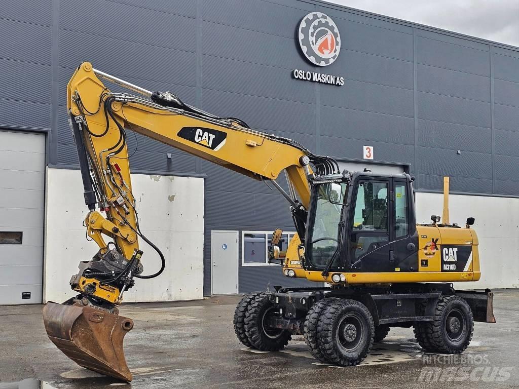 CAT M 316 D حفارات بعجل