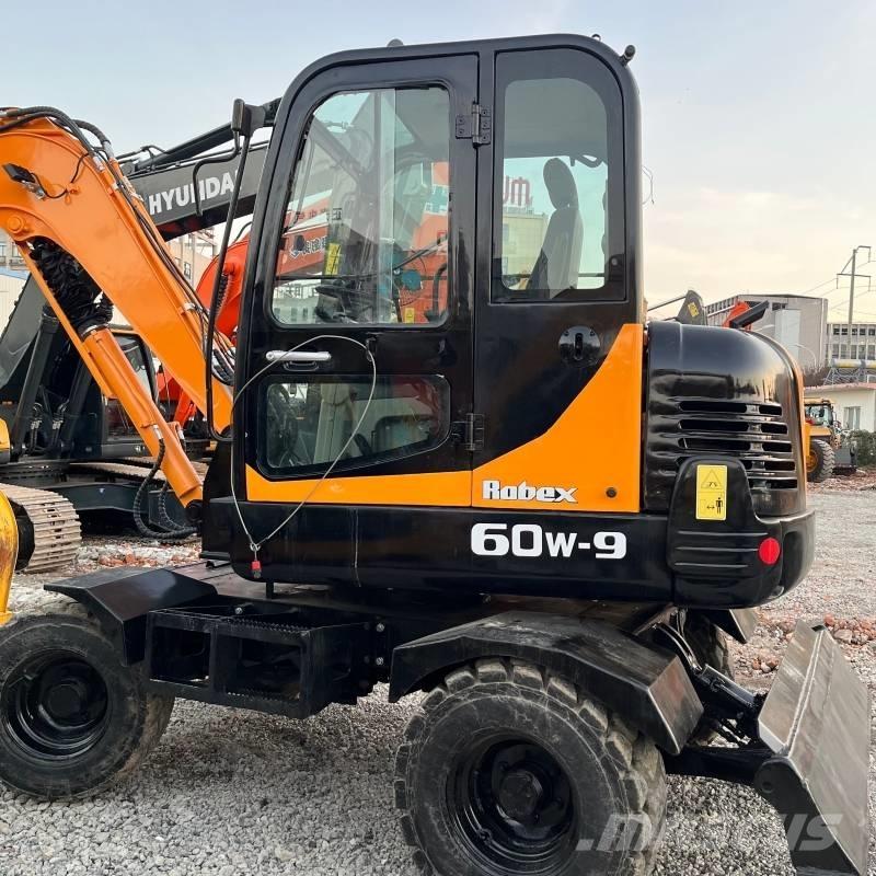 Hyundai R60W-9 حفارات بعجل