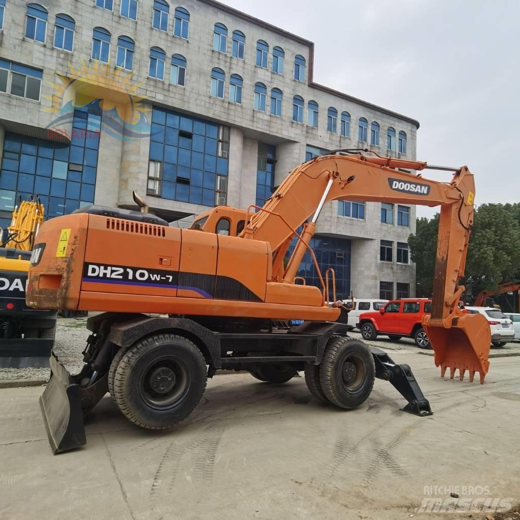 Doosan DH 210 W-7 حفارات بعجل