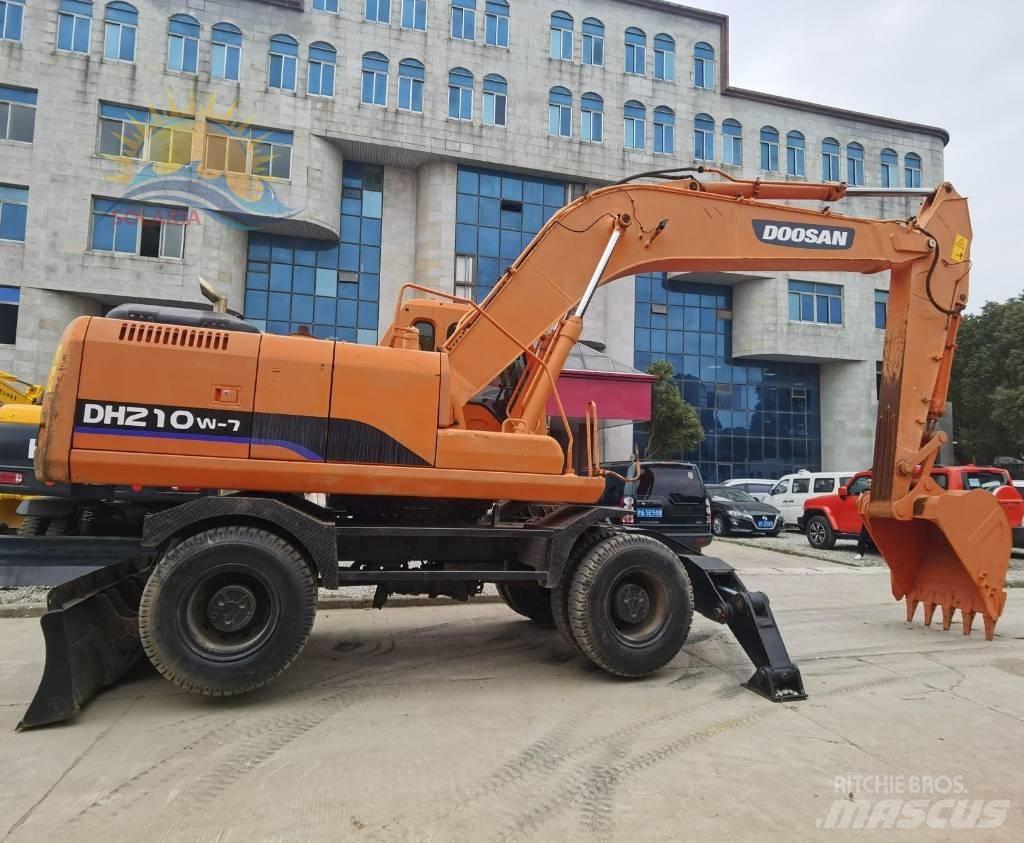 Doosan DH 210 W-7 حفارات بعجل