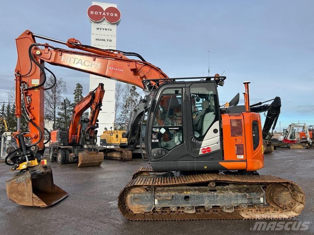 Hitachi ZX 135 US-6 حفارات زحافة