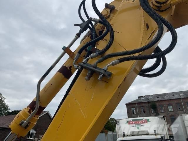 Komatsu PW110MR-11 حفارات بعجل