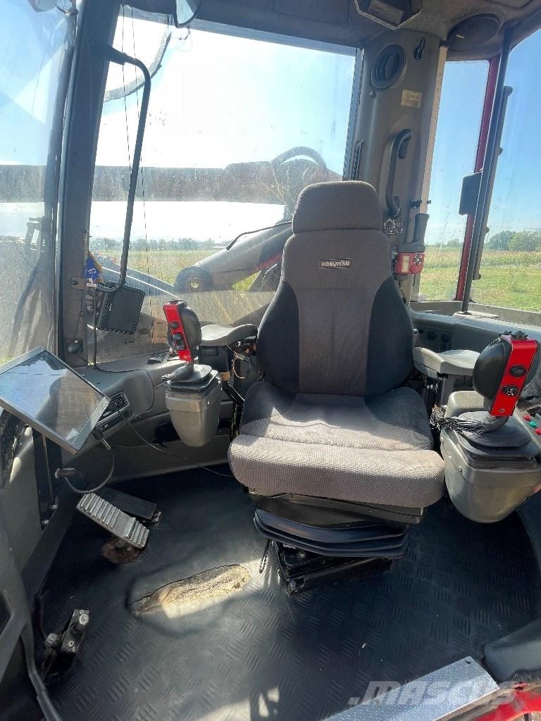 Komatsu 931 حصادات