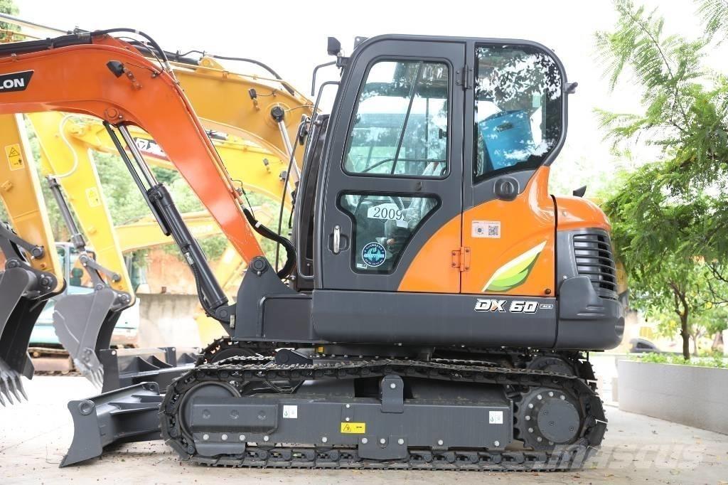 Develon DX 60 E-10 N حفارات بعجل