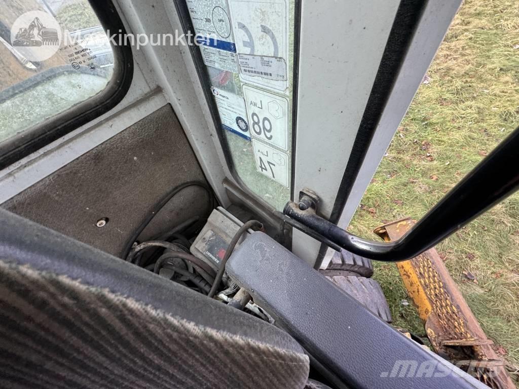 Liebherr A 310 B حفارات بعجل