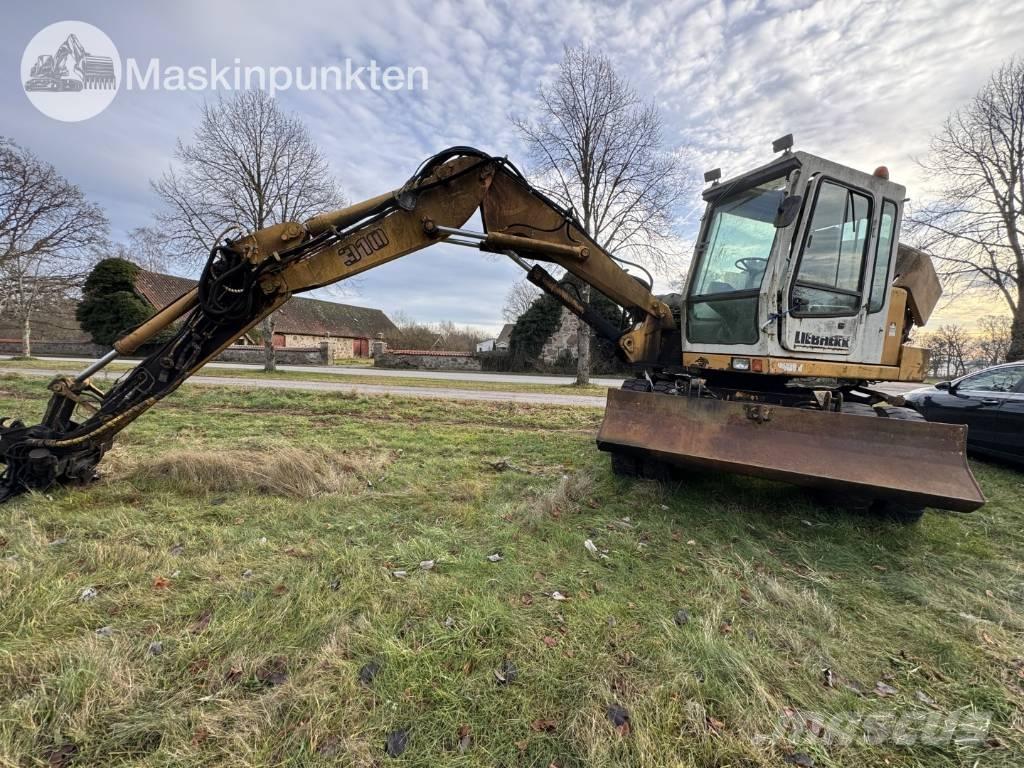 Liebherr A 310 B حفارات بعجل