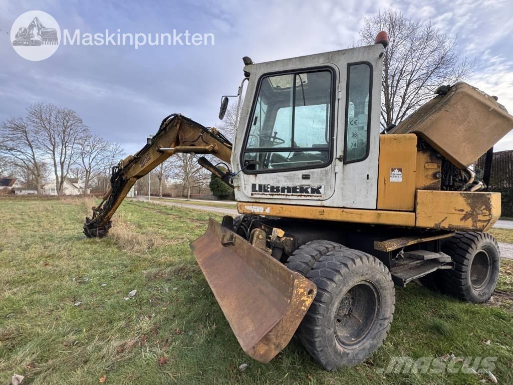 Liebherr A 310 B حفارات بعجل