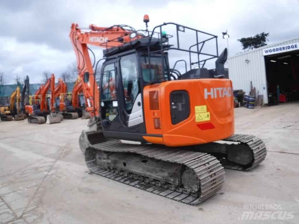 Hitachi ZX 135 US-6 حفارات زحافة