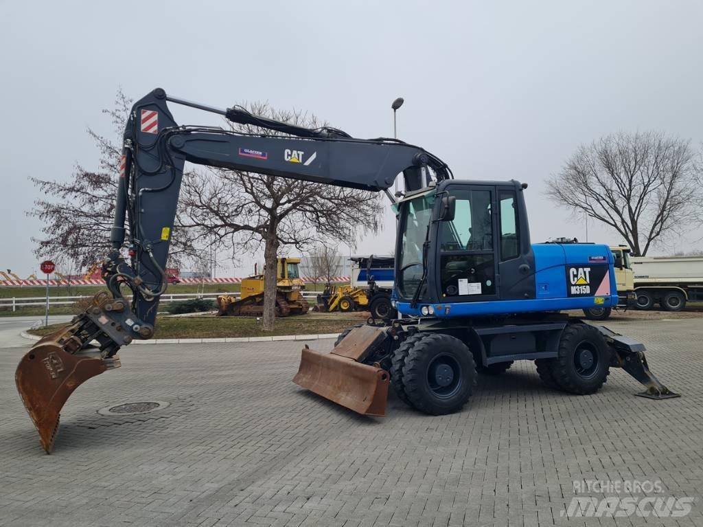 CAT M315D 2 buckets حفارات بعجل