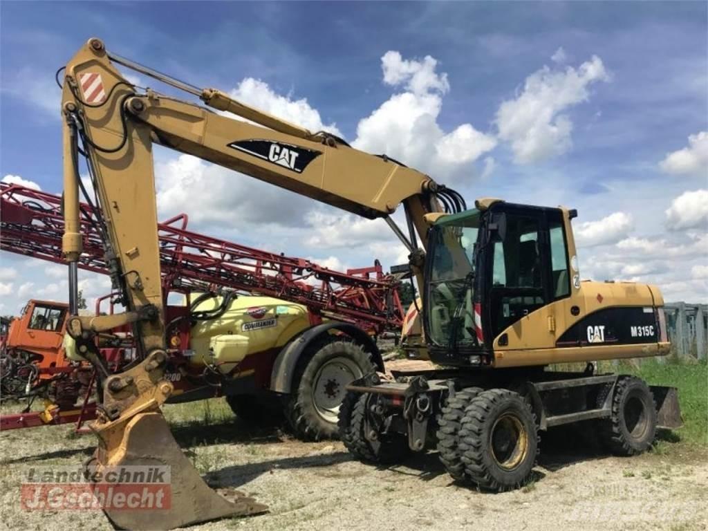 CAT m 315c حفارات بعجل