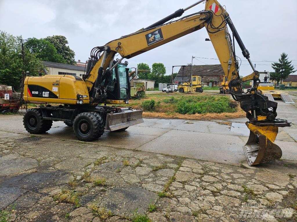 CAT M 316 D حفارات بعجل