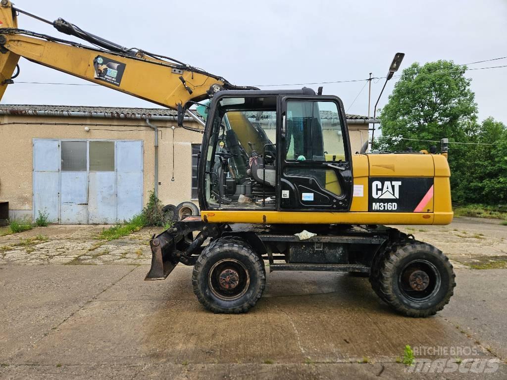 CAT M 316 D حفارات بعجل
