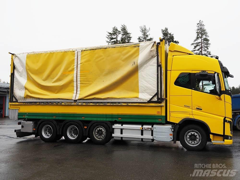 Volvo FH 16 شاحنات نقل ألواح الخشب