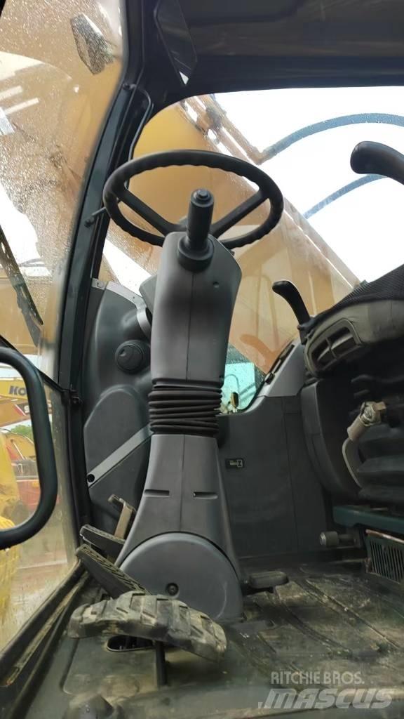Hyundai 210W-9 حفارات بعجل