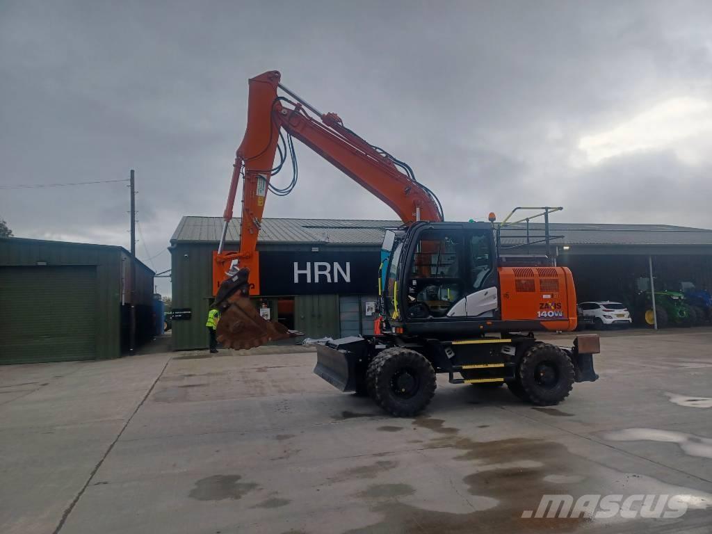 Hitachi 140W حفارات بعجل