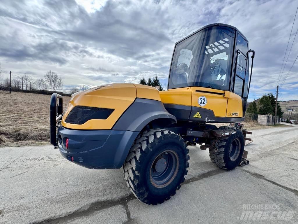 Mecalac 12 M TX لوادر ذات جرافات عكسية