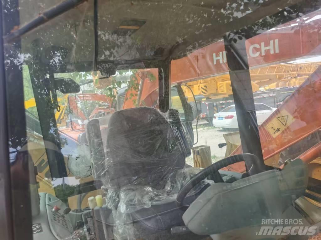 JCB 4 CX لوادر ذات جرافات عكسية
