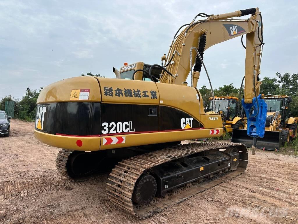 CAT 320 C L حفارات زحافة