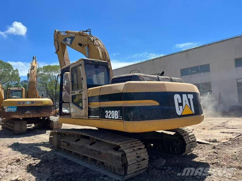 CAT 320 B L حفارات زحافة