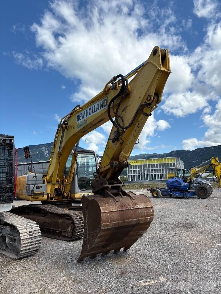 New Holland E 245 B حفارات زحافة