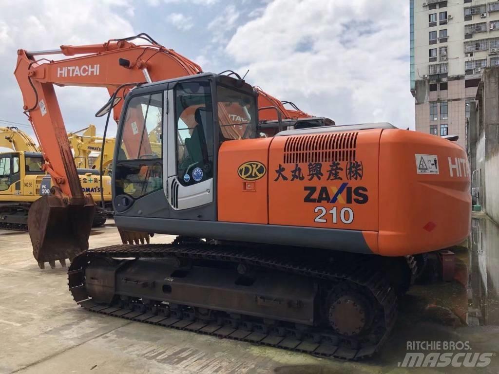 Hitachi zx210 حفارات زحافة