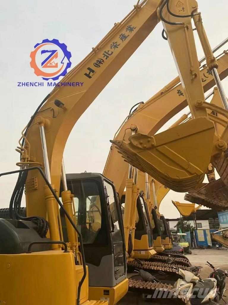 Komatsu PC 128 US حفارات وسط 7 طن - 12 طن