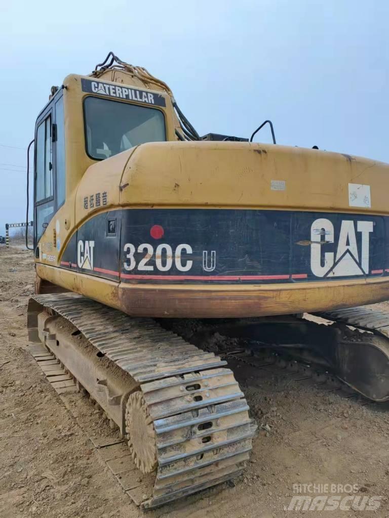 CAT 320 C U حفارات زحافة