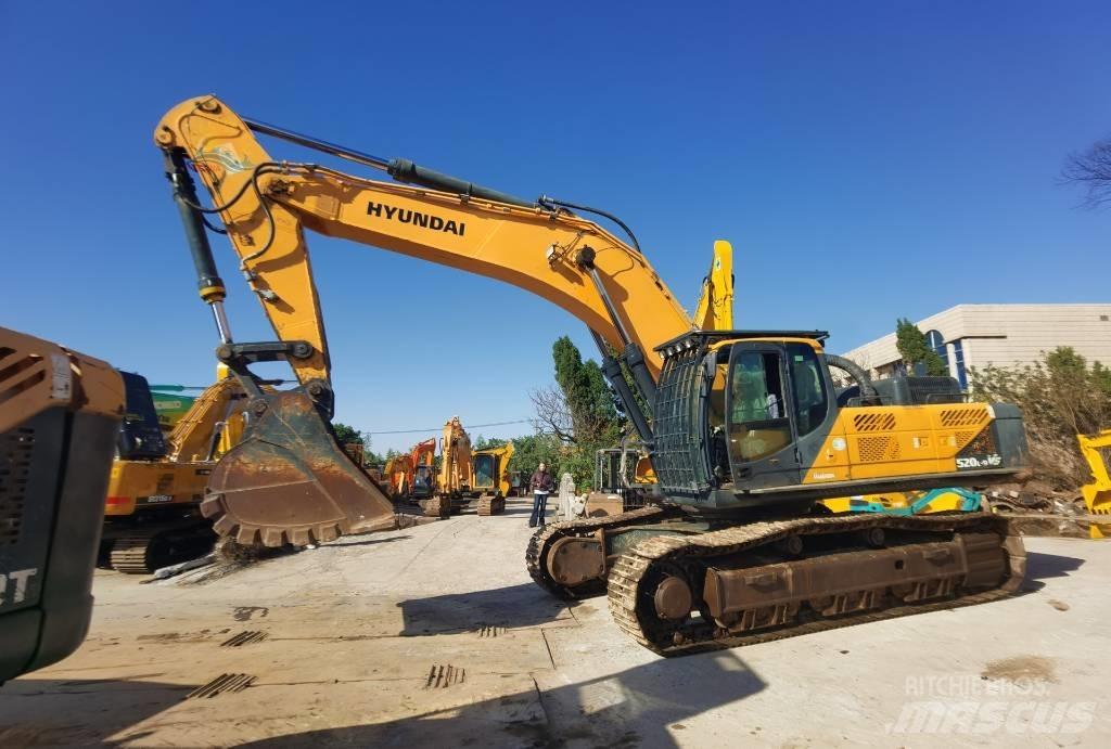 Hyundai 520L-9 VS حفارات زحافة