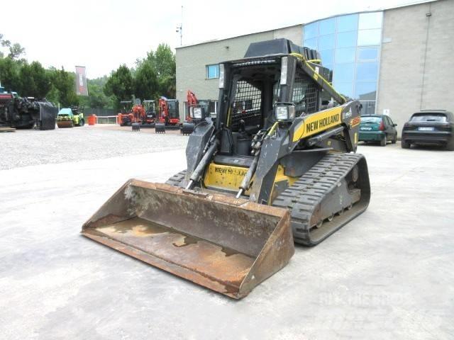 New Holland C185 لوادر صغيرة