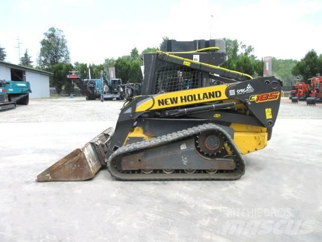 New Holland C185 لوادر صغيرة