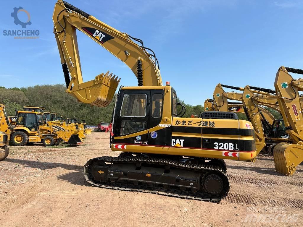 CAT 320 B L حفارات زحافة
