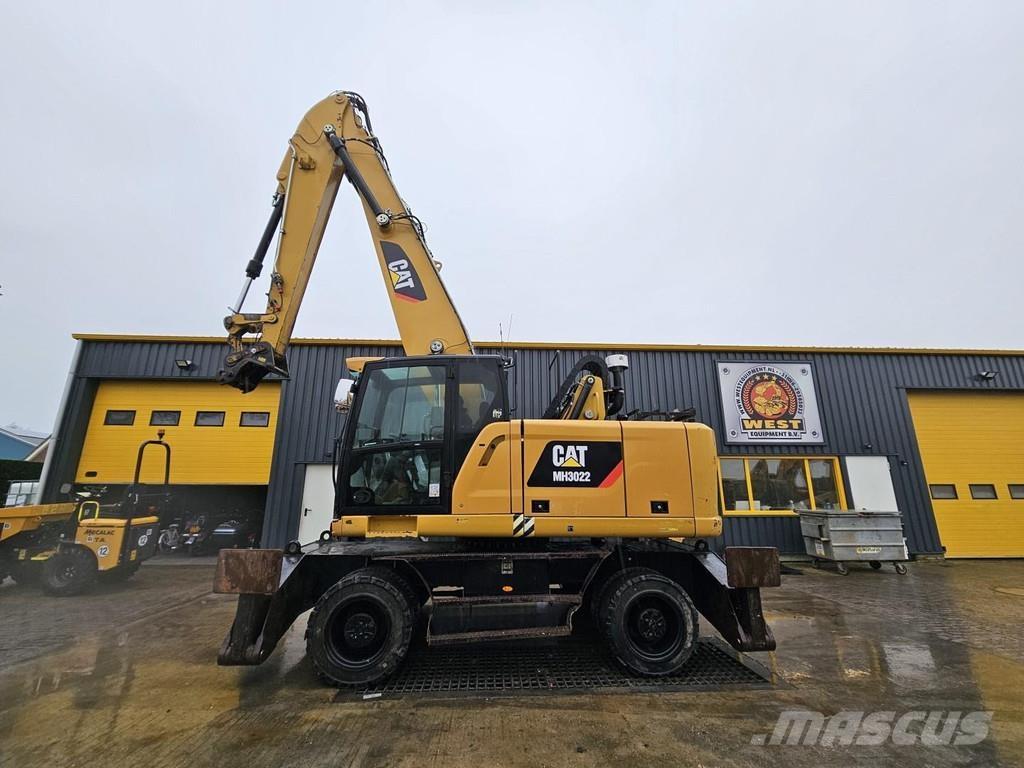 CAT MH 3022 مناولات المخلفات / مناولات صناعية