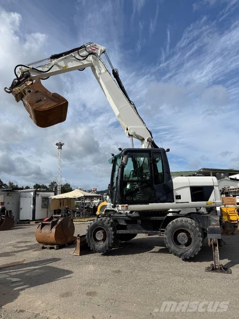 CAT M 316 D حفارات بعجل