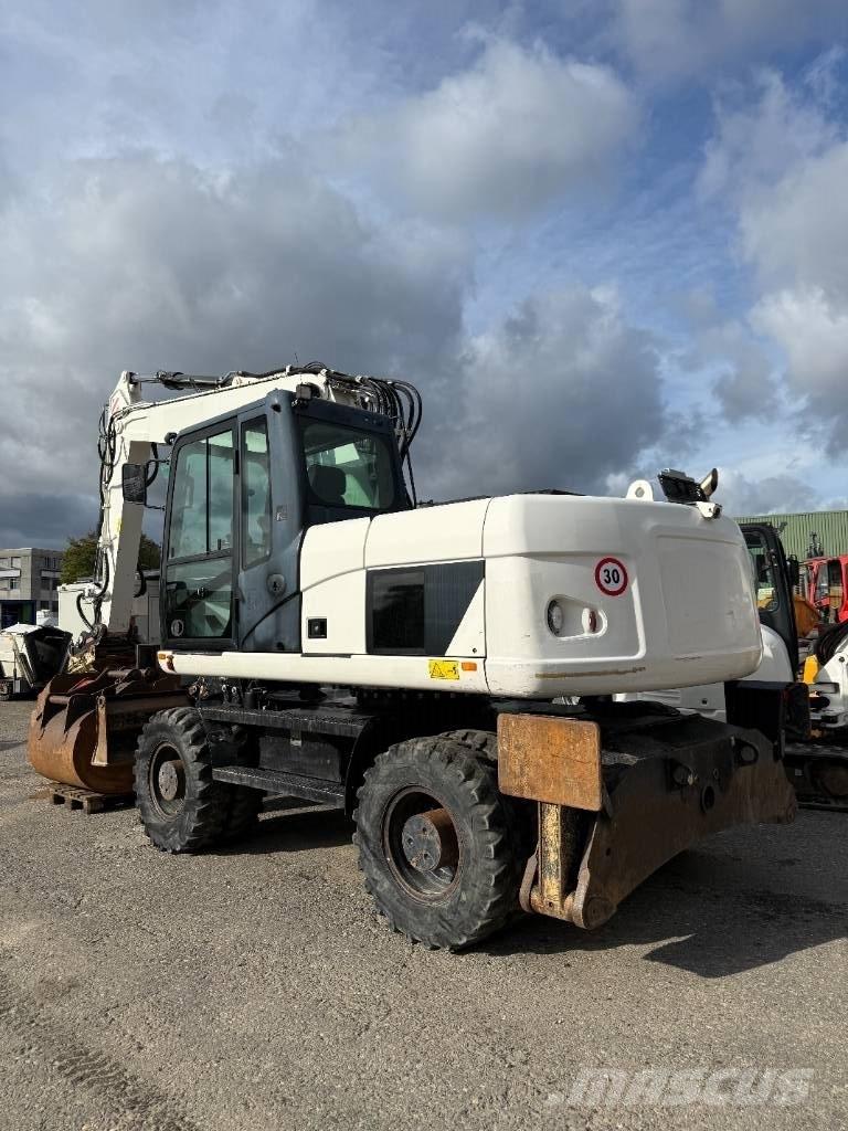 CAT M 316 D حفارات بعجل