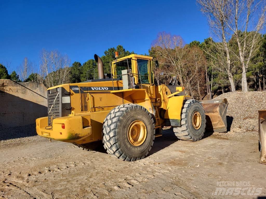 Volvo L 90 لوادر بعجل